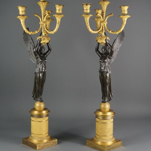 Paire de candélabres en bronze doré.
